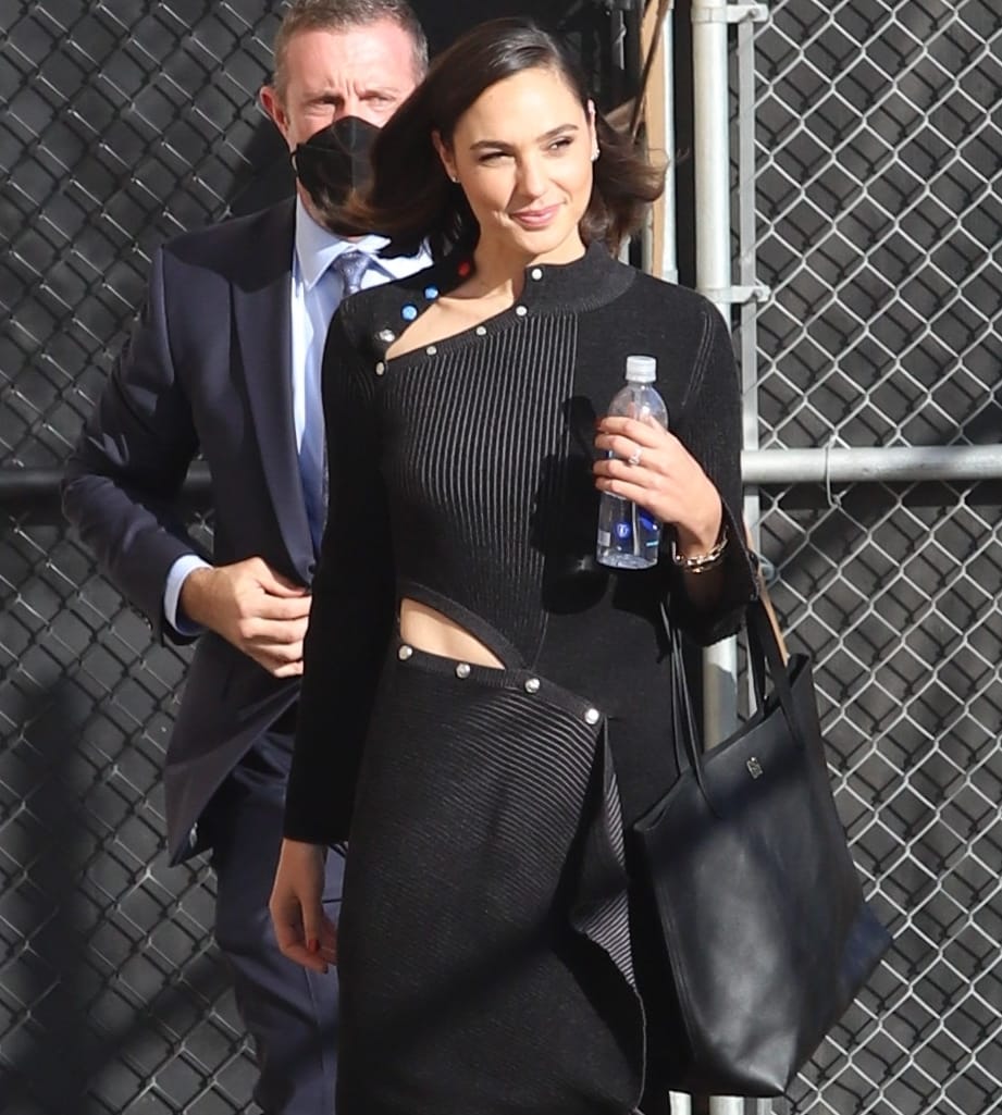 Gal Gadot arrives in an Off-White asymmetrical ribbed midi-dress at Jimmy Kimmel Live! in Los Angeles on November 3, 2021, to promote her new movie Red Notice