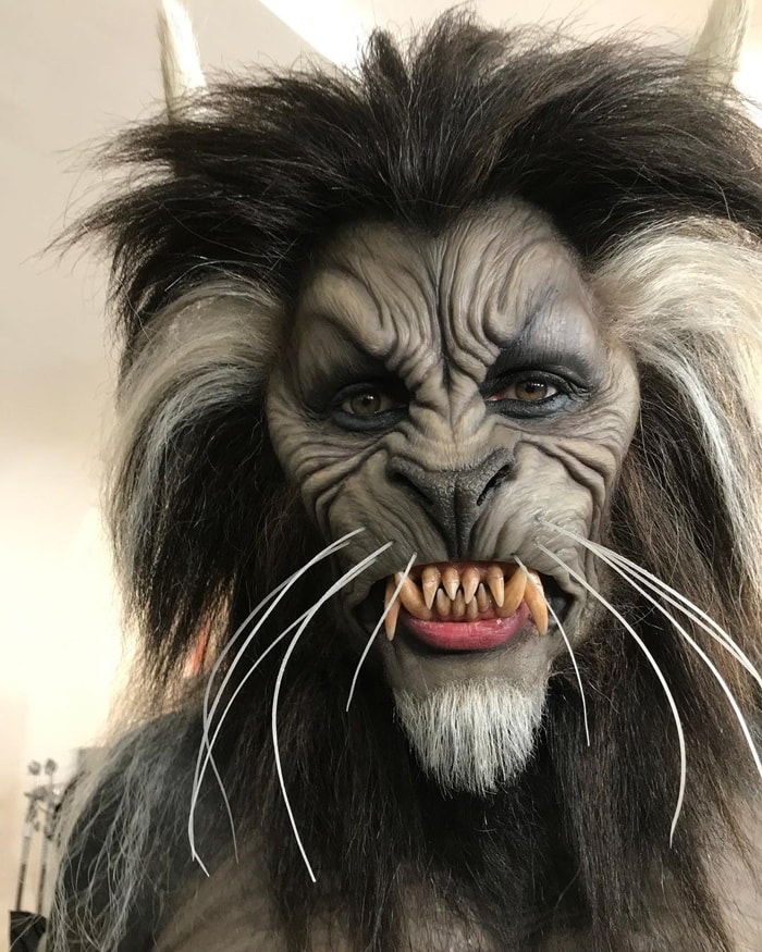 Heidi Klum transforms into a terrifying werewolf, inspired by Michael Jackson's Thriller music video, with intricate prosthetics and detailed makeup for Halloween