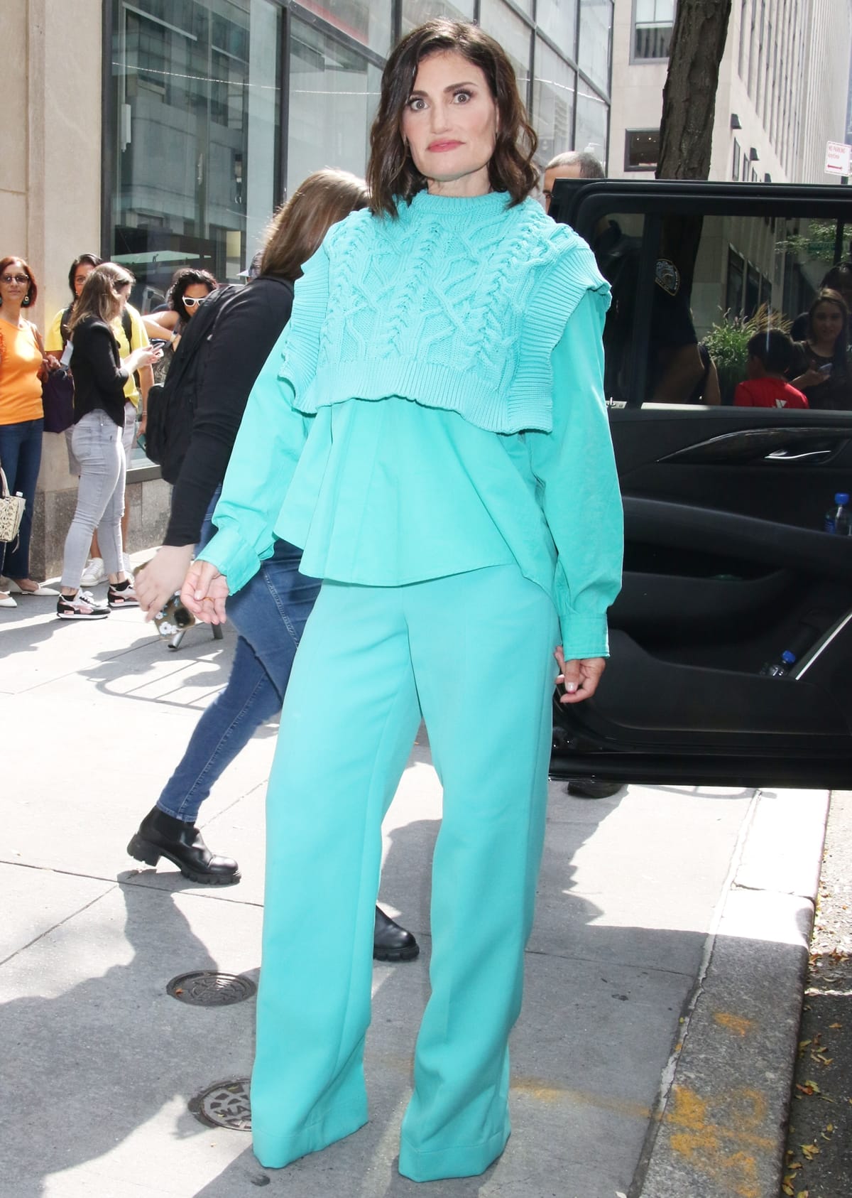 Arriving for a taping of the 'Today' show in New York, United States, on August 17, 2023, Idina Menzel, standing at 5 feet 4 ¼ inches (163.2 cm), discussed her new album Drama Queen