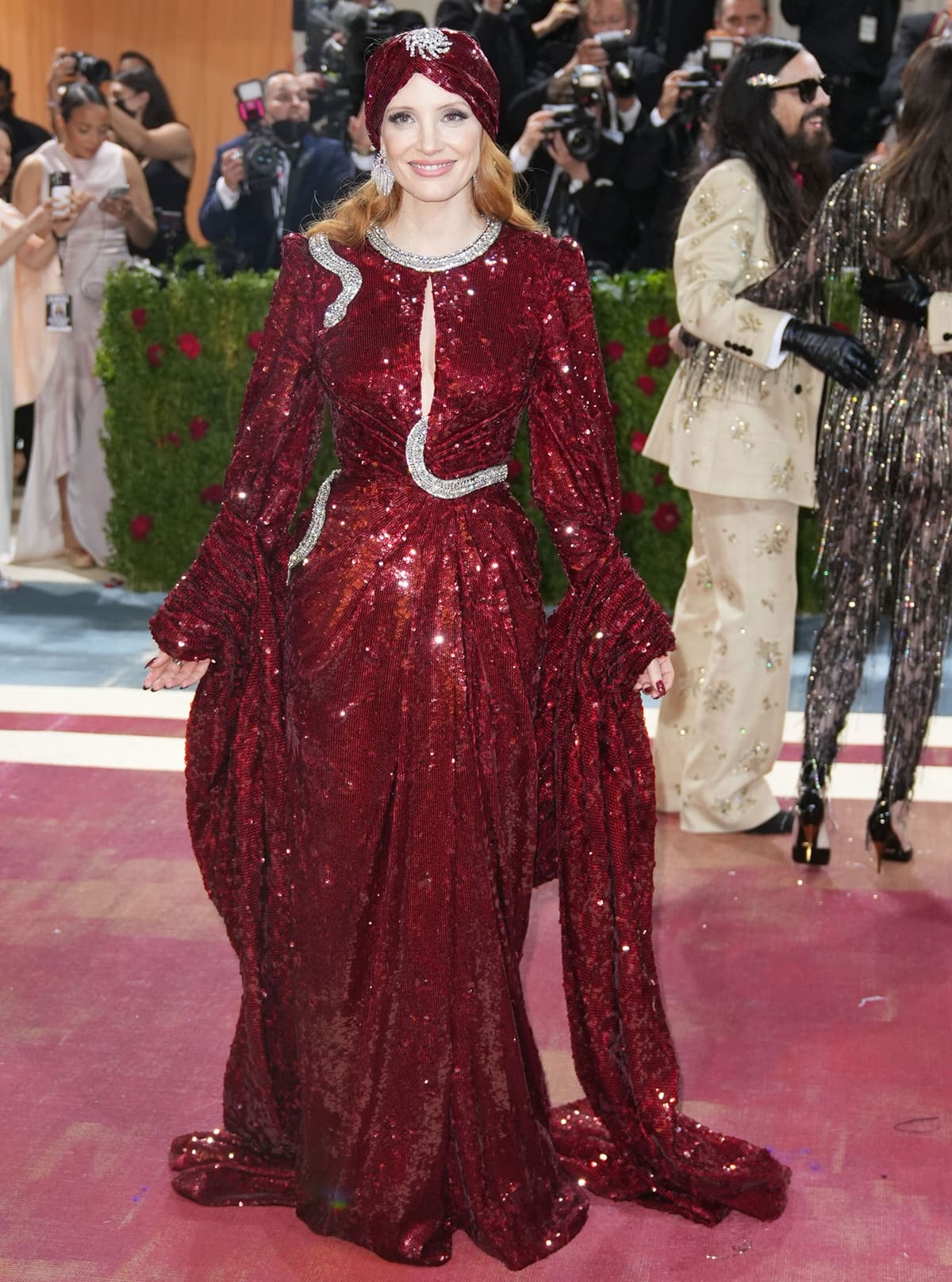 Jessica Chastain in an oxblood Gucci silk all-over sequin gown at the 2022 Met Gala Celebrating "In America: An Anthology of Fashion"