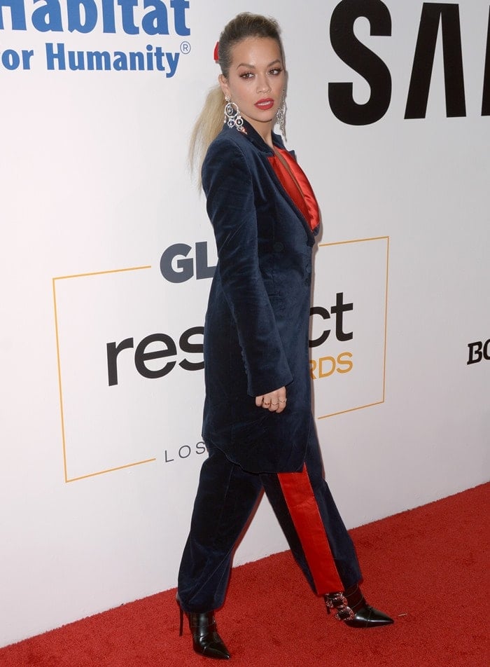 Rita Ora wearing a velvet tuxedo suit by SOS Steve Smith at the Samsung Charity Gala held at Skylight Clarkson Square in New York City on November 2, 2017