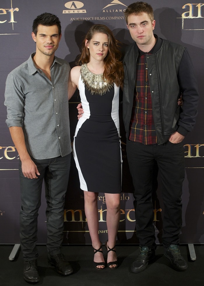 Taylor Lautner, Kristen Stewart, and Robert Pattinson at The Twilight Saga: Breaking Dawn — Part 2 photo call at Villamagna Hotel in Madrid on November 15, 2012