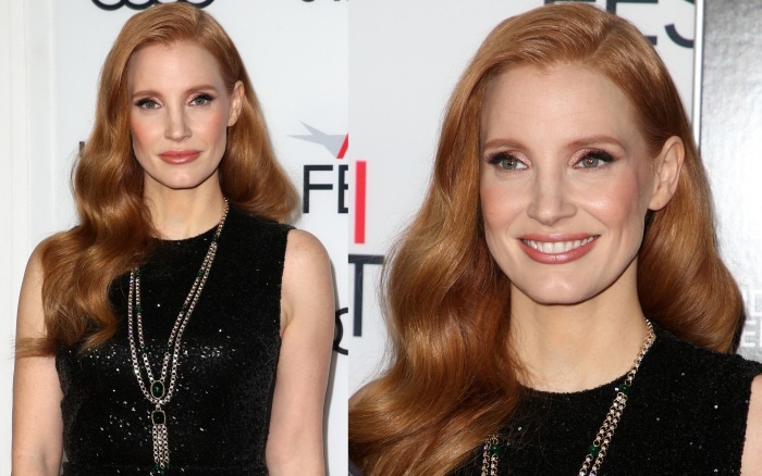 Jessica Chastain smiles with a statement Piaget necklace at the screening of "Molly’s Game"