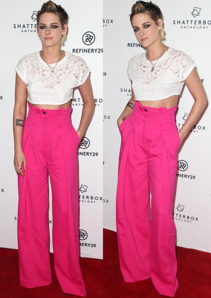 Kristen Stewart styled her look with a white top from Murmur that showed off a glimpse of her toned midriff