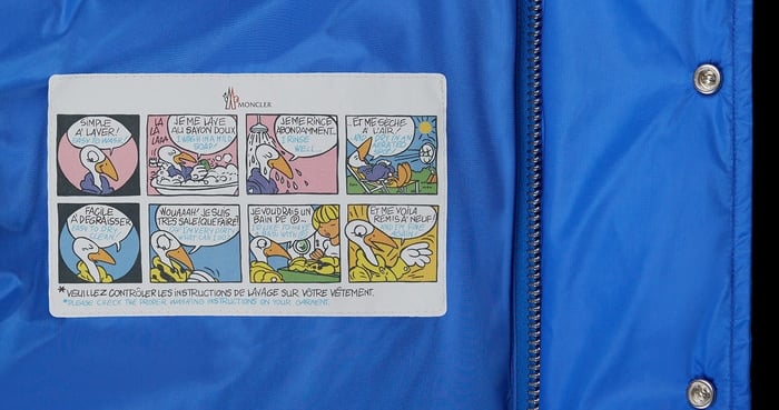Not all Moncler jackets feature the cartoon strip label