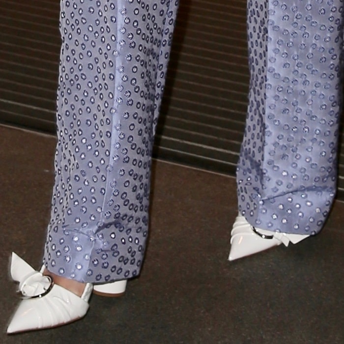 Rita Ora rocking white Dior patent calfskin pointy-toe pumps