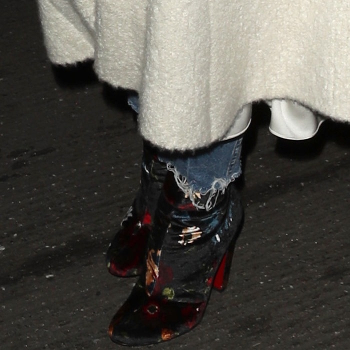 Rosie Huntington-Whiteley wearing floral 'Moulamax' boots from Christian Louboutin