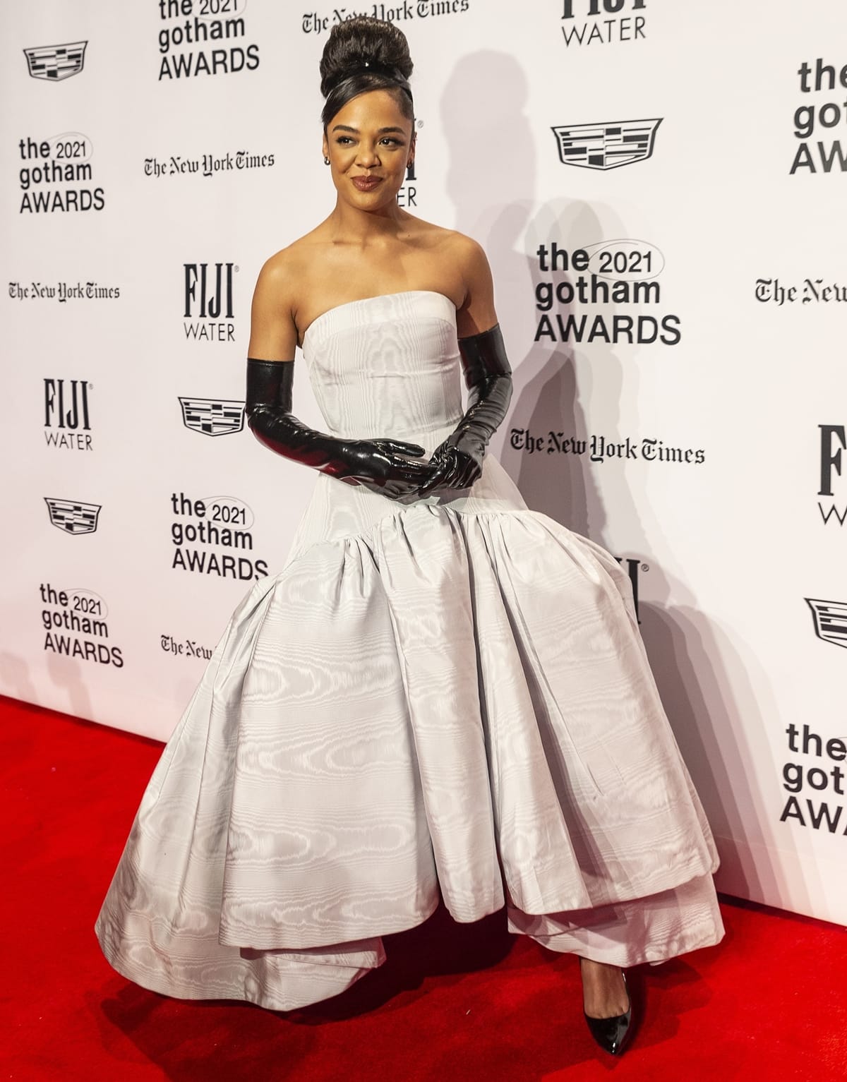 Tessa Thompson wears a Bach Mai strapless dress with gloves at the 2021 Gotham Awards