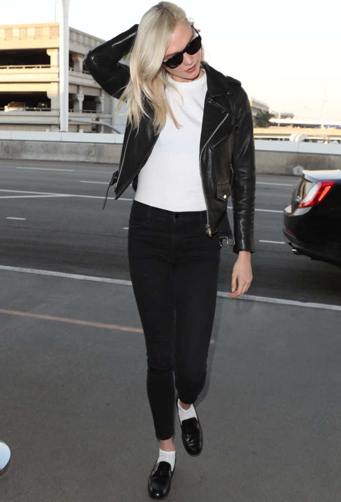 Karlie Kloss rocking J Brand "Maria" skinny jeans and Saint Laurent sunglasses