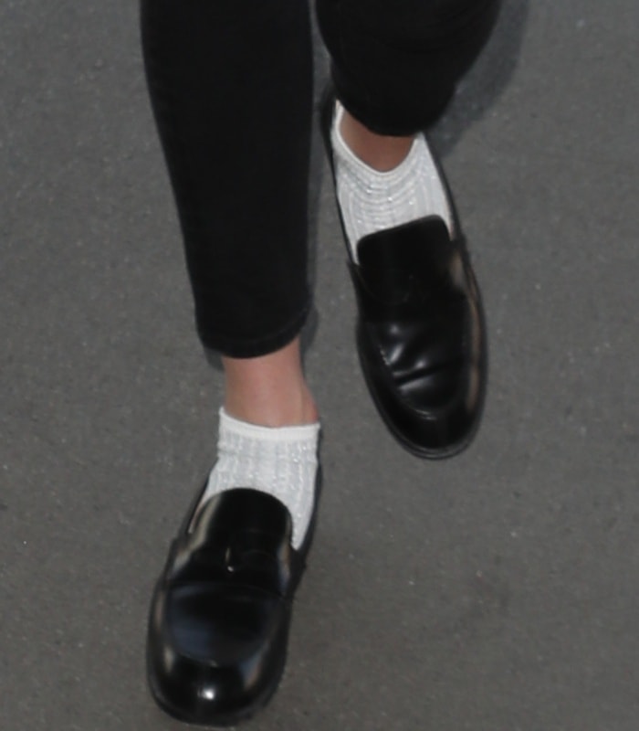 Karlie Kloss wearing Christian Louboutin Montezumo Donna loafers with white socks