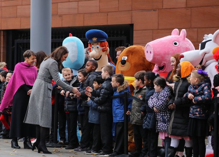 Kate Middleton wearing the L.K. Bennett "Delli" coat, Goat "Elodie" dress, and Tod’s black suede pumps during the Children's Global Media Summit in Manchester