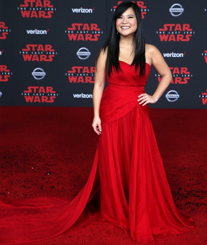 Kelly Marie Tran chose a show-stopping, blazing red gown from Thai Nguyen Atelier for her red carpet debut