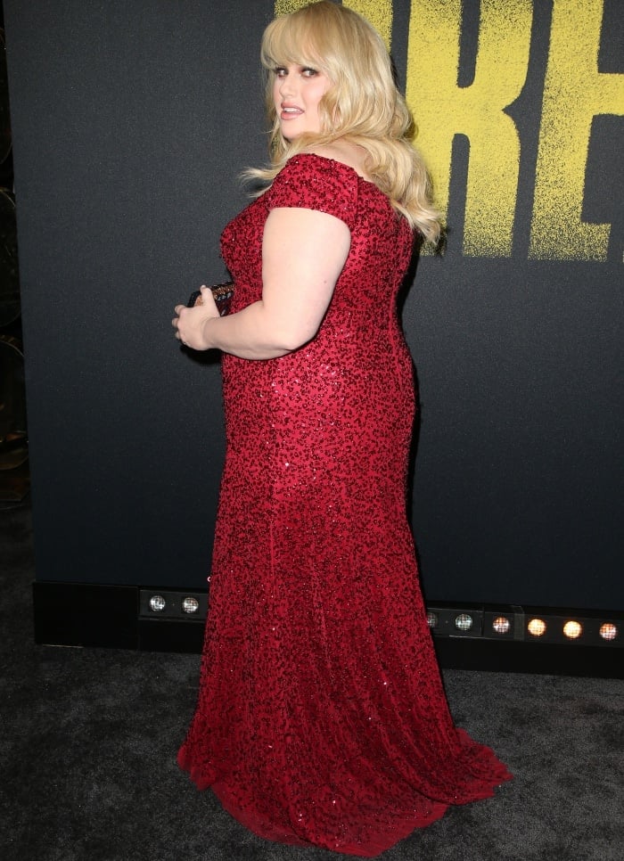 Rebel Wilson wearing a red sequined Adrianna Papell dress and Rupert Sanderson shoes at the "Pitch Perfect 3" premiere