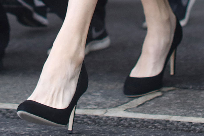 Angelina Jolie shows off her feet in Giuseppe Zanotti's "Annette" black suede pumps