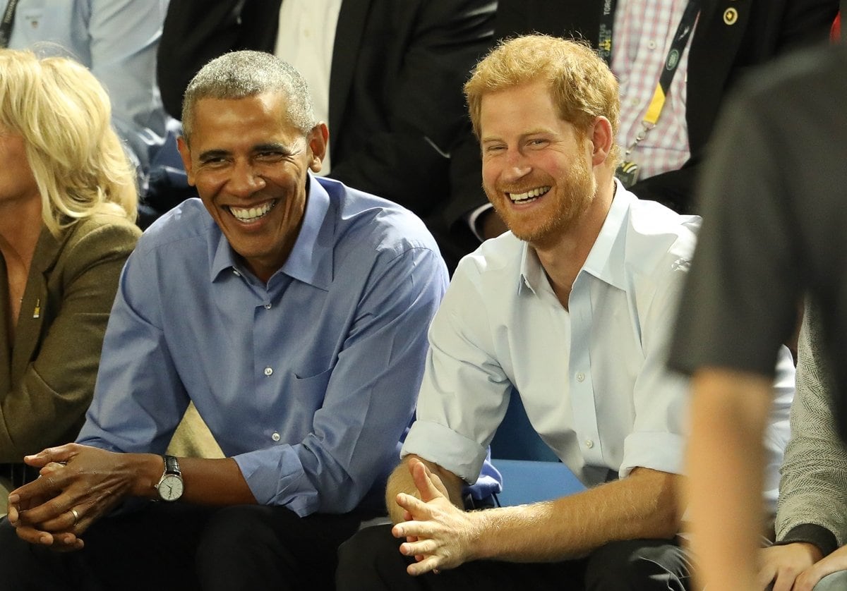 Former U.S. President Barack Obama and Prince Harry have a good time watching wheelchair basketball on day 7 of the Invictus Games