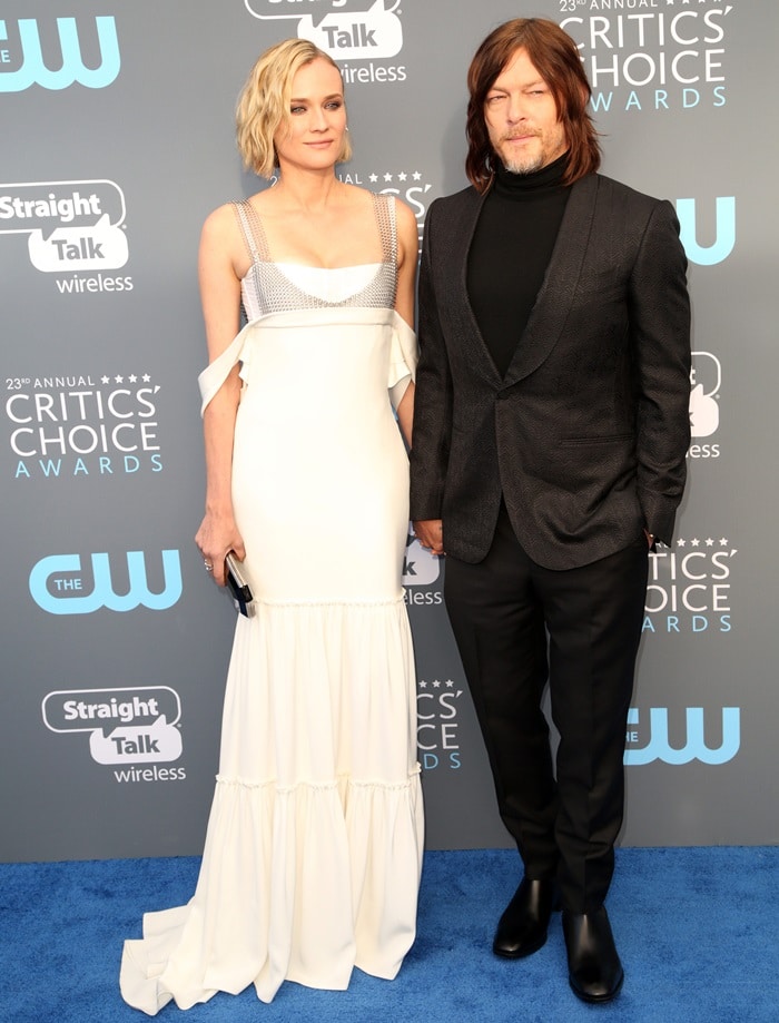 Norman Reedus, posing with Diane Kruger, rocking 'Samson' leather boots from Christian Louboutin's Spring/Summer 18 collection
