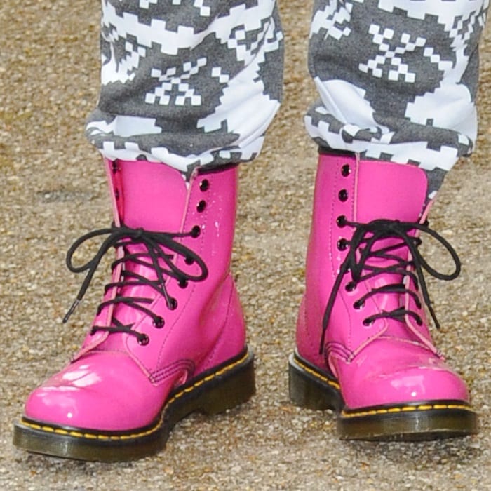 British singer-songwriter Gabz Gardiner showing off her pink boots with laces through the lower six eyelets at the ITV studios in London on July 3, 2013