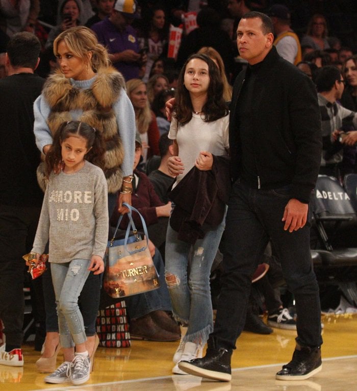 Jennifer Lopez carries a ‘Turner NeoNoe’ canvas bag from the Louis Vuitton x Jeff Koons “Masters” collaboration