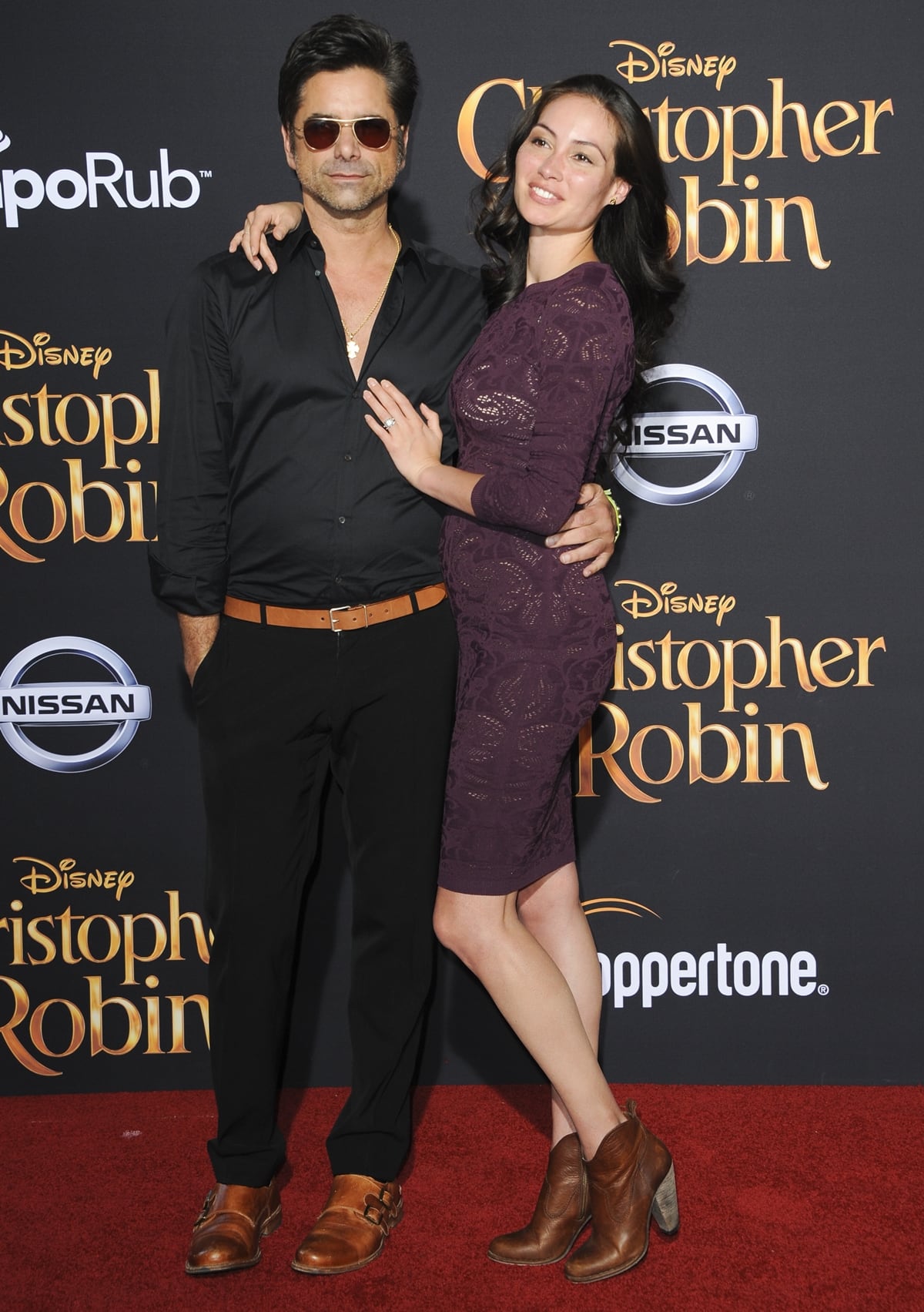 John Stamos is slightly taller and 23 years older than his wife Caitlin McHugh