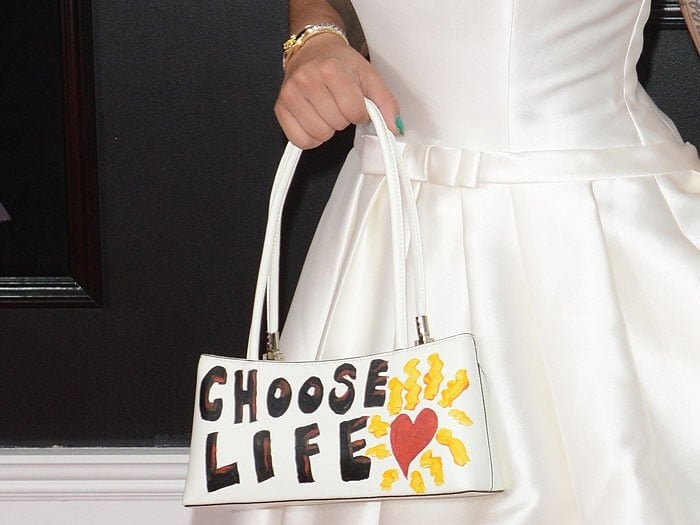 Details of Joy Villa's statement-making white handbag that she hand-painted with a "choose life" message