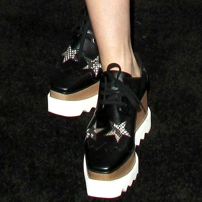 Stella McCartney 'Else' platform oxfords with faux-python star cutouts on Kiernan Shipka.