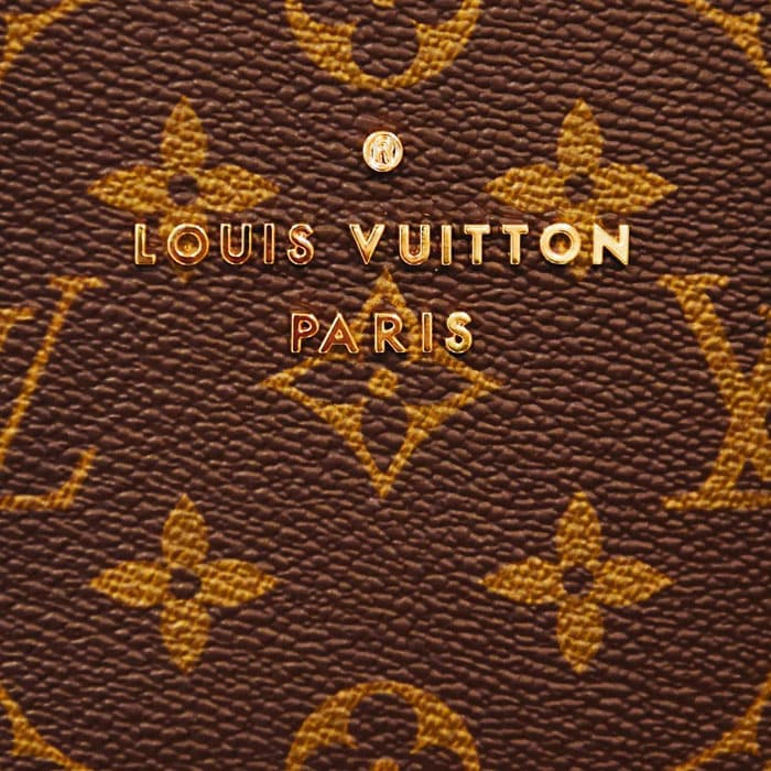 The classic Louis Vuitton logo embellished on monogrammed leather