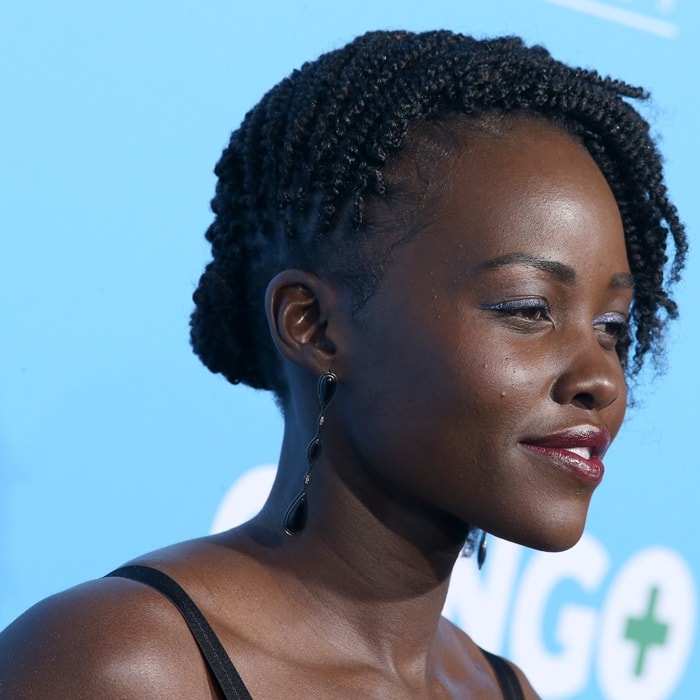 Lupita Nyong’o sported a Black Panther-inspired head full of side-swept flat twists