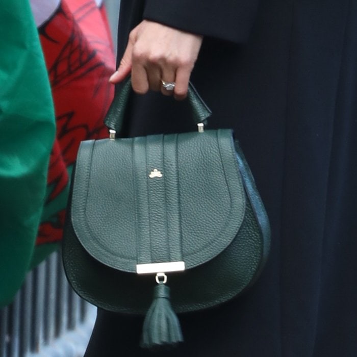 Meghan Markle toting an elegant DeMellier London ‘Mini Venice’ bag