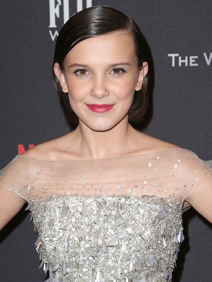 Millie Bobby Brown wearing a silver sequined Jenny Packham dress