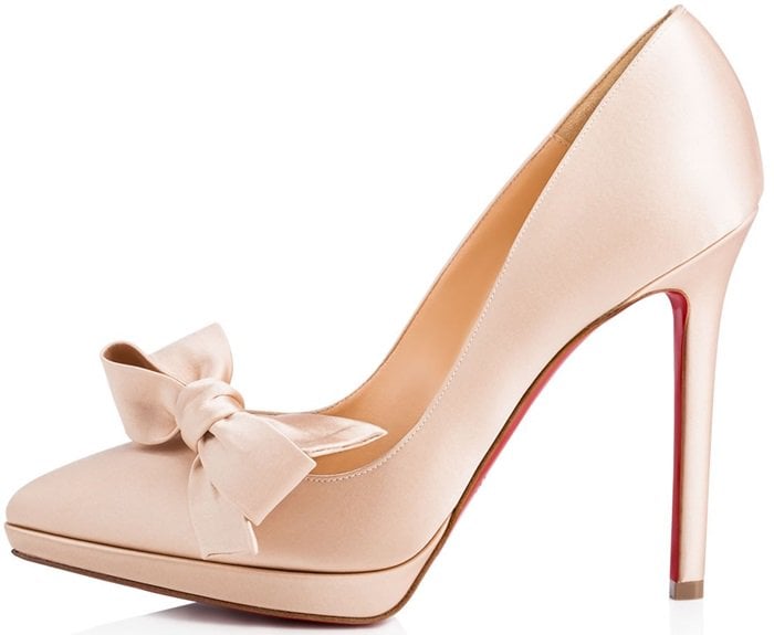 "Miss Pigalle" is the signature Christian Louboutin icon dressed ...