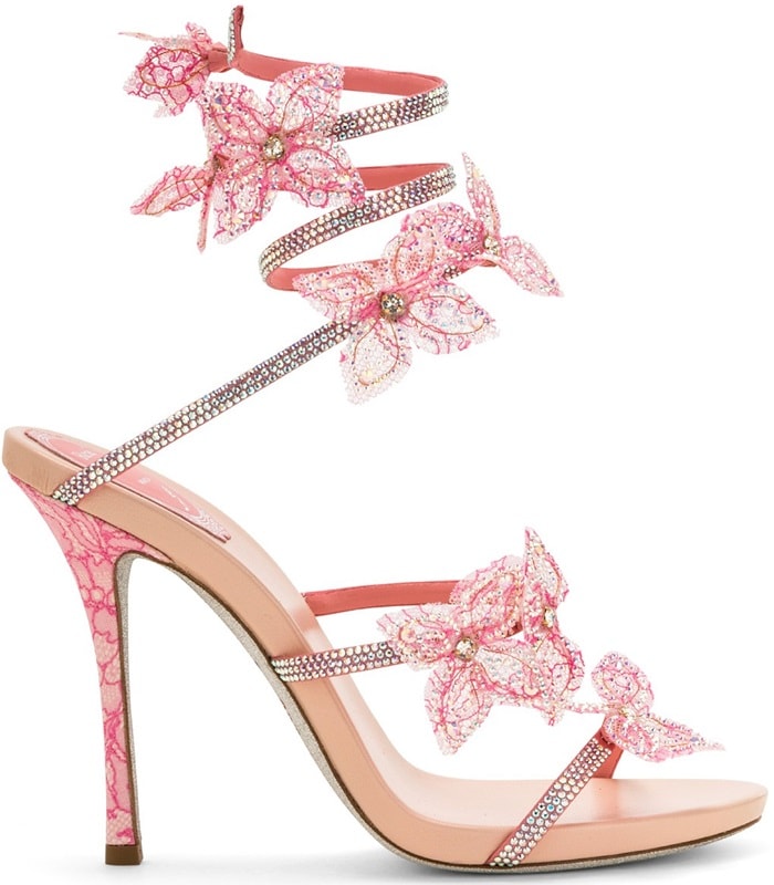 Pink satin sandal with a slender strap and snake wrapping around the ankle