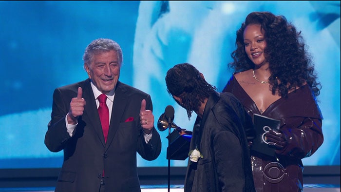 Rihanna and Kendrick Lamar accepting their Best Rap/Sung Performance award from Tony Bennett at the 2018 Grammy Awards.