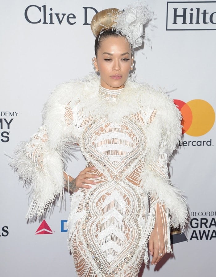 Rita Ora wearing a Zuhair Murad Fall 2017 Couture dress on the red carpet as she arrives at Clive Davis‘ annual Pre-Grammys Party in New York City on January 27, 2018