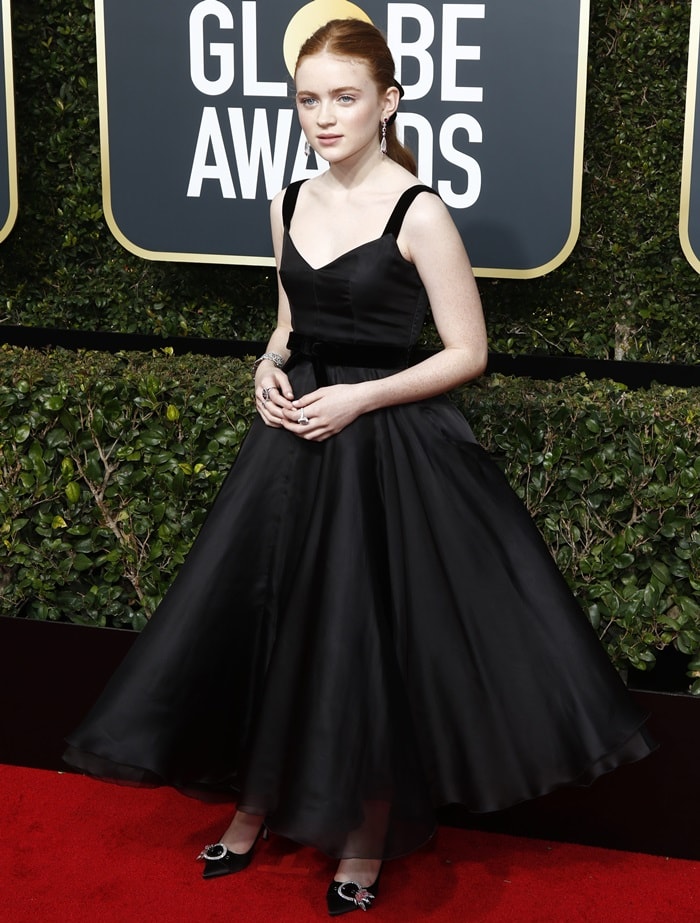 Sadie Sink wearing an age-appropriate ankle-length Miu Miu dress at the 2018 Golden Globe Awards held at the Beverly Hilton Hotel in Beverly Hills, California, on January 7, 2018