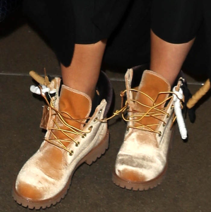 Khloe Kardashian wearing Timberland x Off-White leather lace-up boots at the Los Angeles International Airport