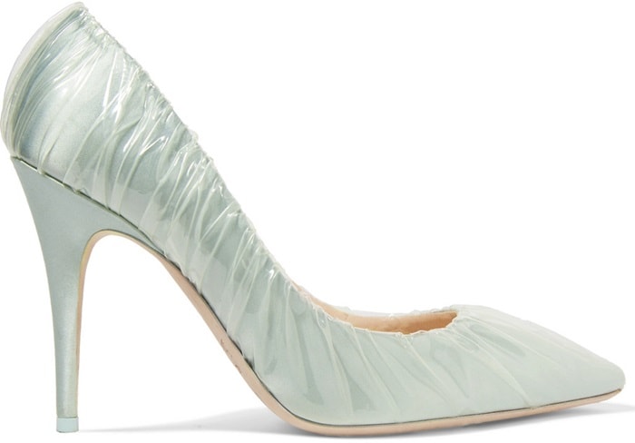 They have been made in Italy from light-blue satin and are covered with clear PVC to resemble glass slippers