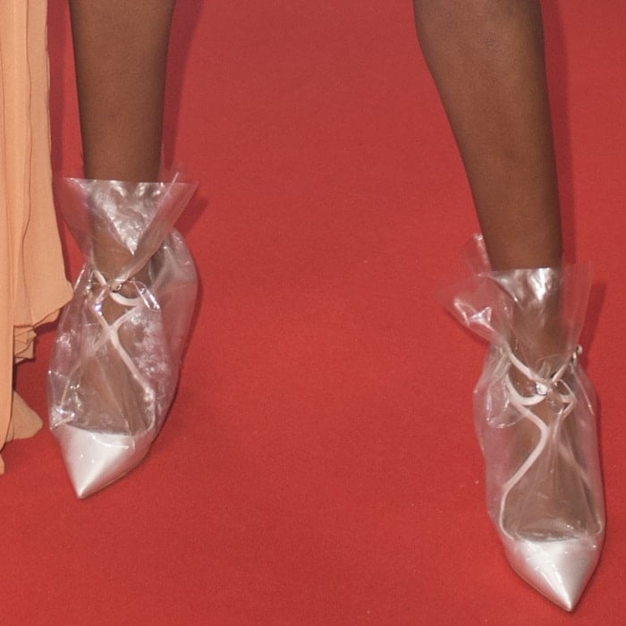 Damaris Lewis rocking 'Claire' 100 plastic bag pumps in white satin