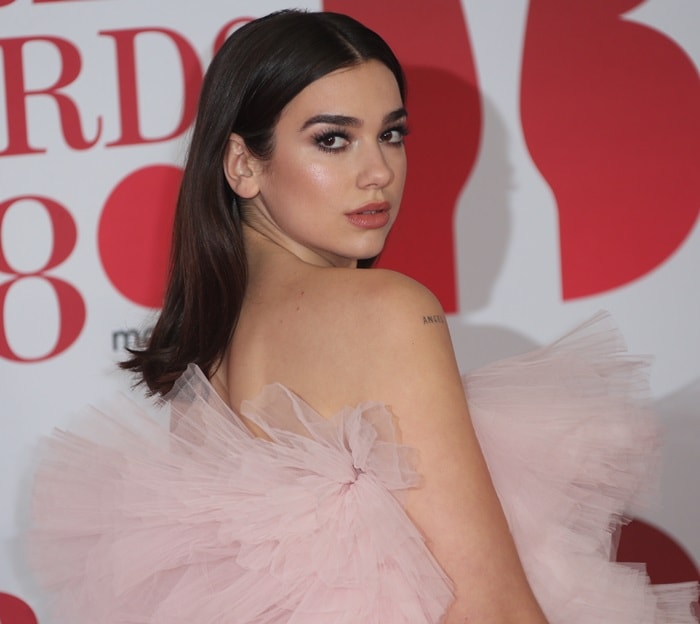 Dua Lipa wearing a Giambattista Valli Spring 2018 Couture dress at the 2018 BRIT Awards held at The O2 Arena in London, England, on February 21, 2018
