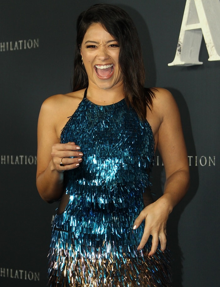 Gina Rodriguez in a slinky turquoise ombré beaded halter gown from Cristina Ottaviano’s Fall 2017 collection