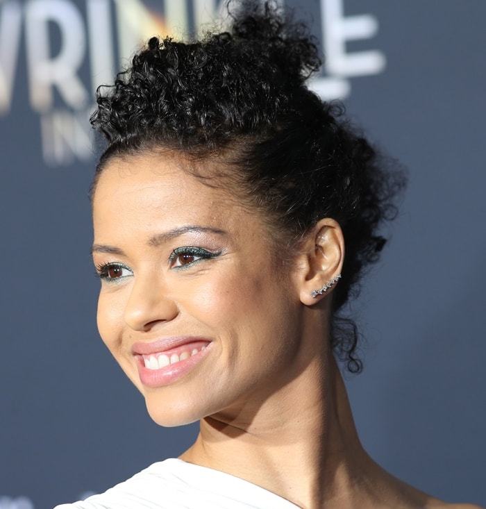 Gugu Mbatha-Raw kept her hair in a curly bun
