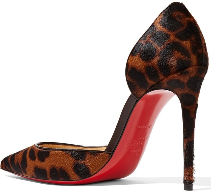 Christian Louboutin's 'Iriza' 100 pumps in leopard-print pony hair showcase the iconic red sole and flattering d'Orsay silhouette for timeless elegance