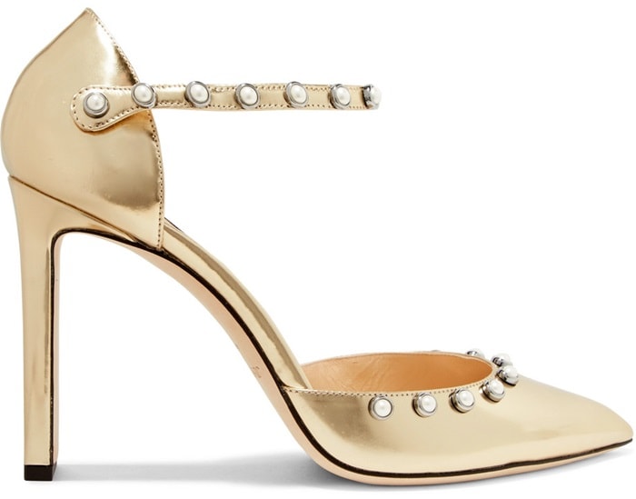 These luxurious pumps are made from gold leather by skilled artisans in Italy. The pointed toe and elasticated ankle strap are adorned with shimmering faux pearls