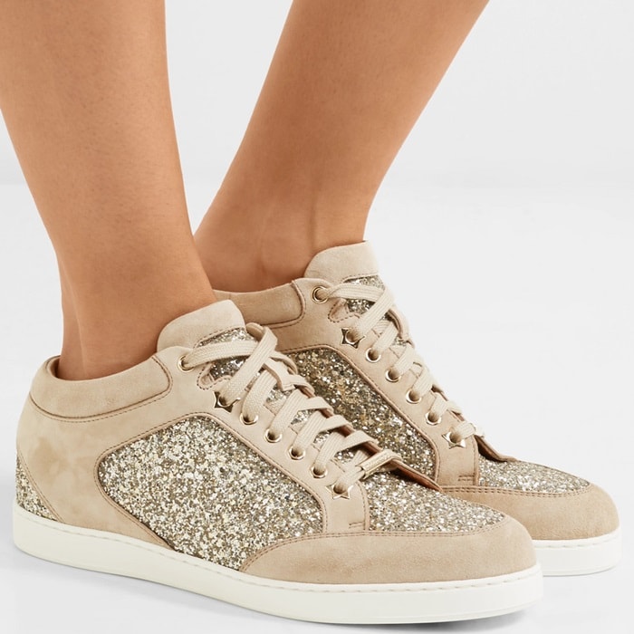 Perfect for fans of the brand's glamorous designs, Jimmy Choo's 'Miami' sneakers are paneled with glitter at the heel, side and toe. They're made from supple beige suede and have cushioned padding at the ankle, so you know they're going to be just as comfortable as they are pretty.