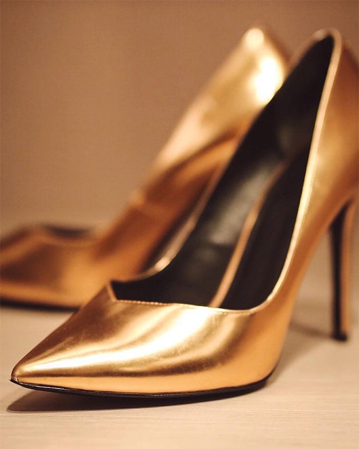 Kate Upton's Instagram post of her Stella Luna "Indispensable" pumps in metallic gold, posted on February 24, 2018