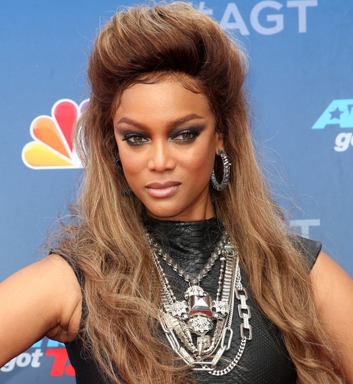 Tyra Banks wearing a statement necklace from Glynneth B Jewelry