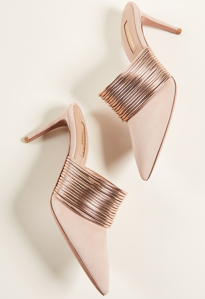 You definitely need a rendezvous with these amazing goatskin mules. Rose-gold cords amp up the glamour