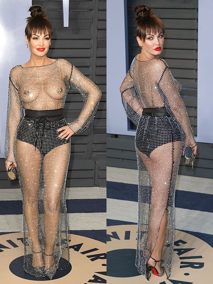 Bleona Qereti flashing boobs and underwear in a sheer mesh dress.