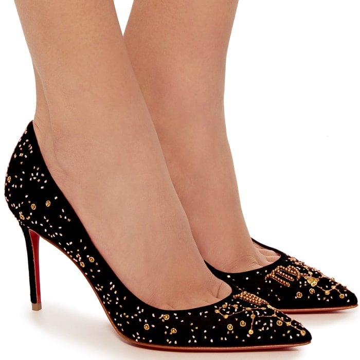 This limited edition pump is rendered in satin and features an intricate embroidered detail and minimalist silhouette