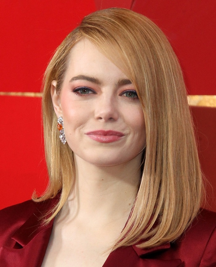 Emma Stone wearing sparkly drop earrings