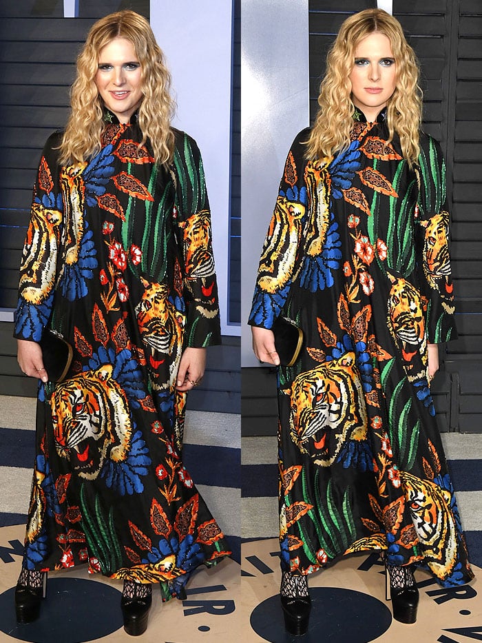 Transgender model Hari Nef in a Gucci tiger-head-print dress and black platforms.